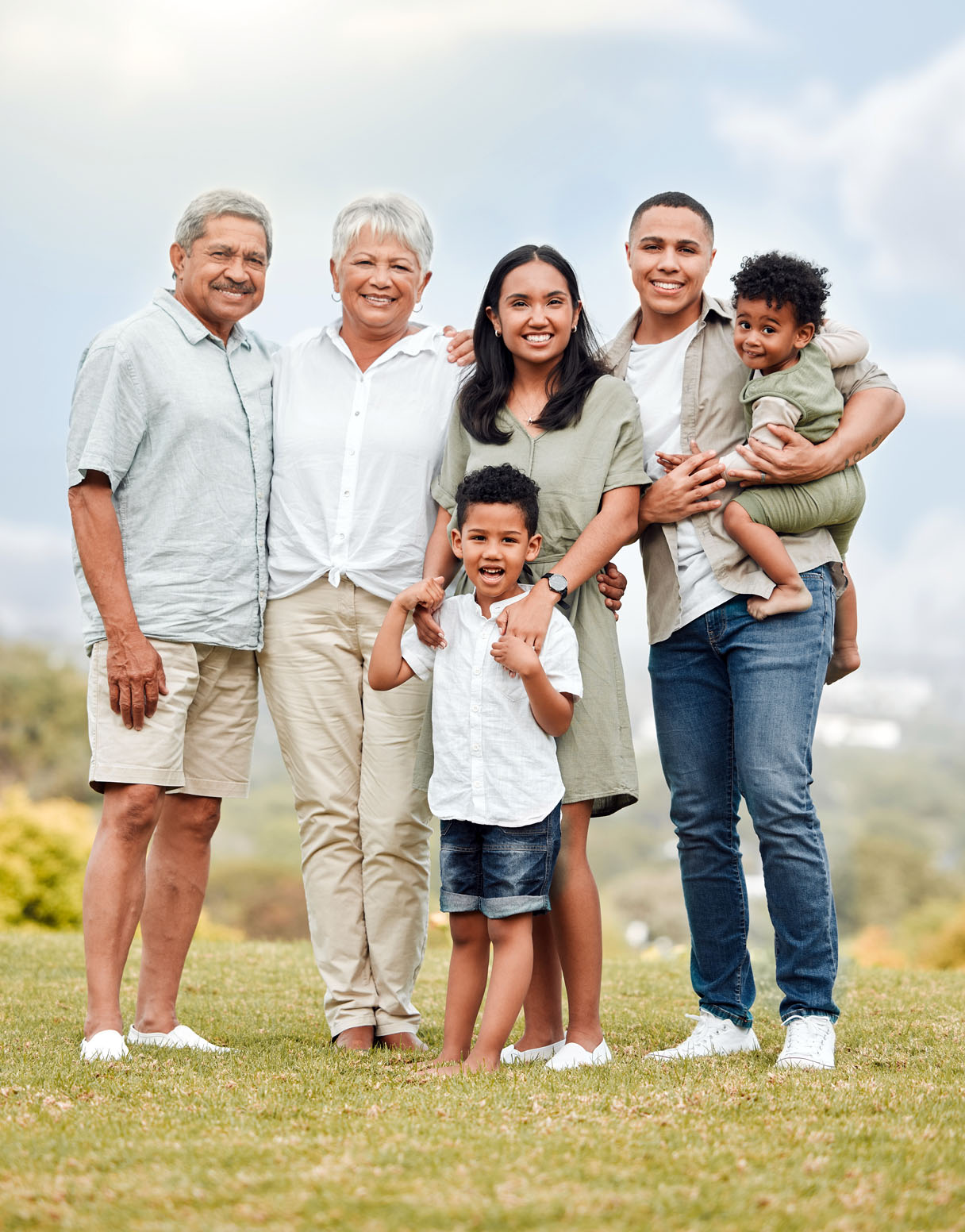 Diverse multigenerational family smiling